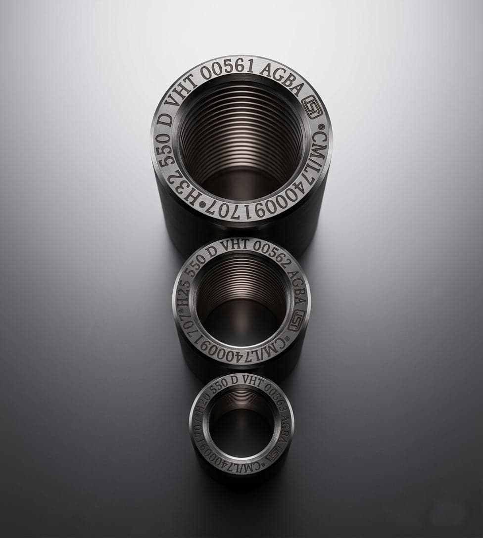 Three AGBA couplers in Ø32, Ø25 and Ø20, seen from above, each ring laser-marked with its batch number, class, steel grade and BIS licence number.